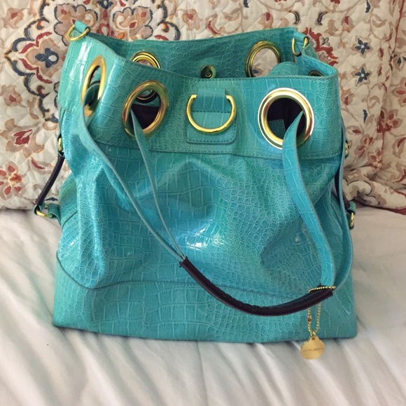Big Buddha turquoise purse.