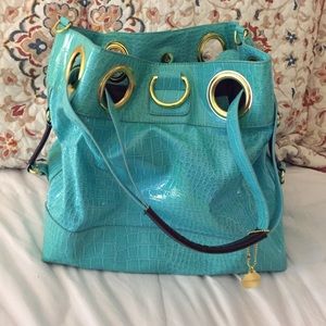 Big Buddha turquoise purse.