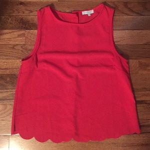 Scalloped edge tank
