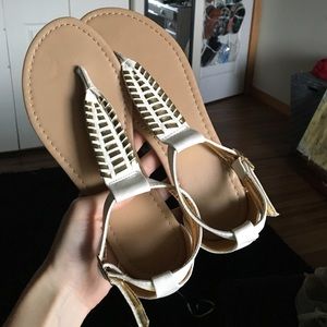 Gold and white sandals