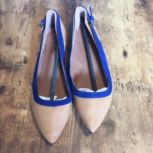 Tan flats with navy trim