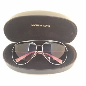 White Michael Kors aviator sunglasses.