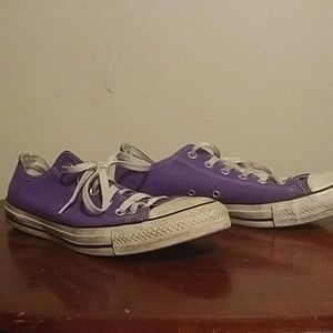 Purple low-top converse sneakers