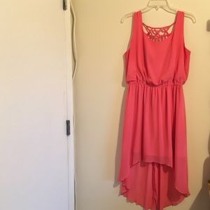 A salmon/pink dress