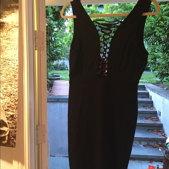 Black mini dress with laced cleavage