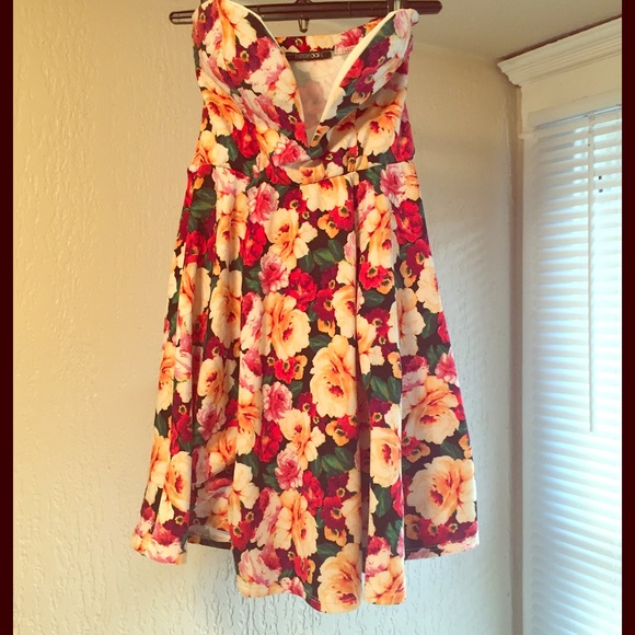 Deep Plunging sweetheart dress.