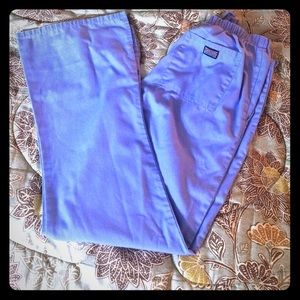 Light blue scrub pants.