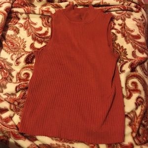 A high neck kinda cropped orange