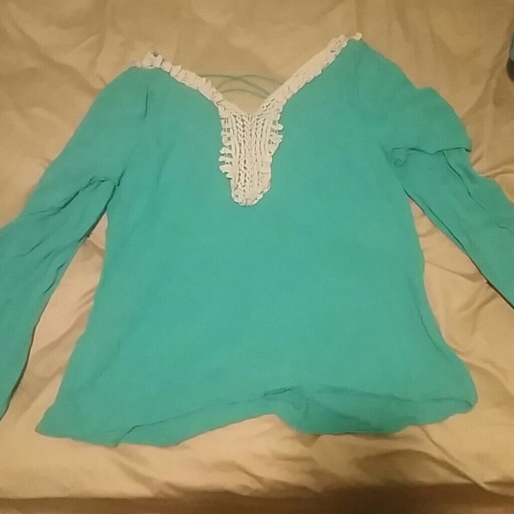 Teal colored shirt