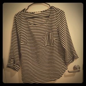 Striped boat neck blouse perfect for work.