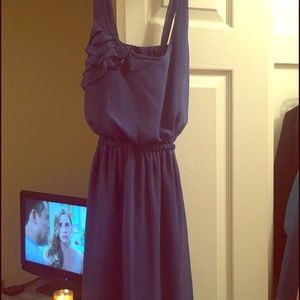 Blue dress. Crosses in back. Size medium