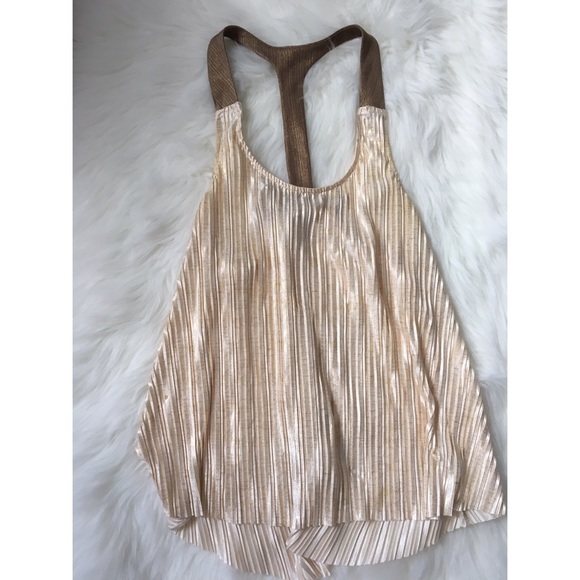 Gold accordion-style club tank!