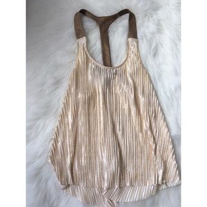 Gold accordion-style club tank!