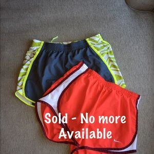 2 pairs of Nike Dri-Fit shorts