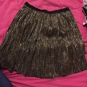 Gold, silver, and black shiny skater skirt