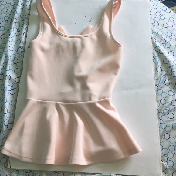 Pink pendulum top with bow back