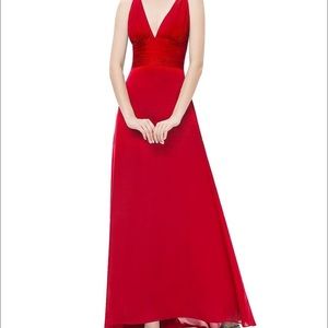 Red satin open back dress with train
