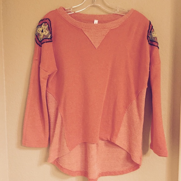 High low sweater with beaded shoulders!