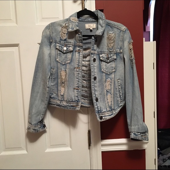 Ripped Jean jacket! Very stylish