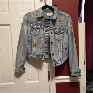 Ripped Jean jacket! Very stylish