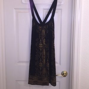 Black and gold sleeveless dress