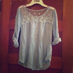 Light weight blue shirt with sheer shoulders