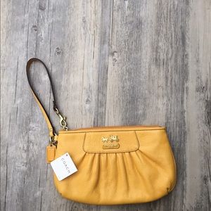 NWT Coach yellow "Madison" Wristlet