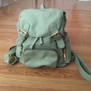 Mint green leather backpack