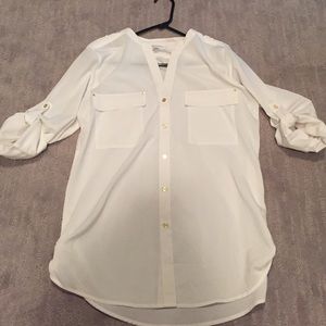 White Calvin Klein shirt with gold buttons