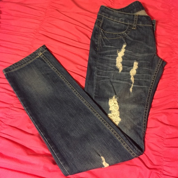 Distressed designer jeans