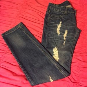 Distressed designer jeans
