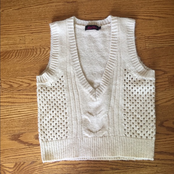 Cream colored sweater vest