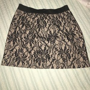 Black and beige lace miniskirt