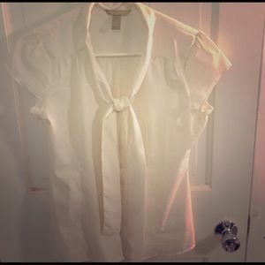 One cream and one black blouse