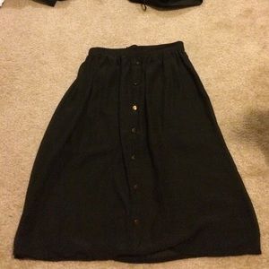 High waisted skirt. Goes to your knees