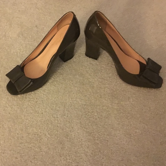 Brown patent peep toe pumps