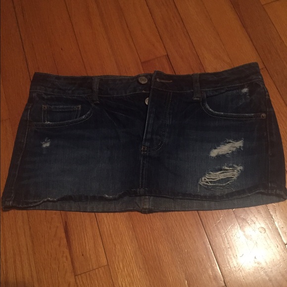Distressed denim mini skirt