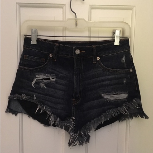 High Waist Distressed Denim Shorts pockets showing