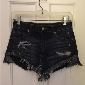 High Waist Distressed Denim Shorts pockets showing