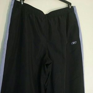 black and purple reebok running pants