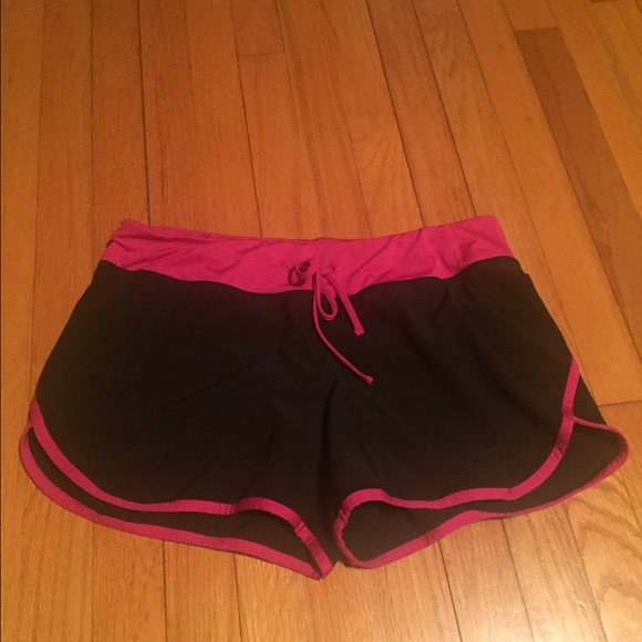 Black and bright pink running short with liner.