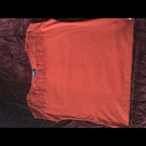Red Top with crochet work around the neck