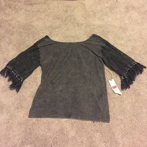 Small Gimmicks shirt from buckle.