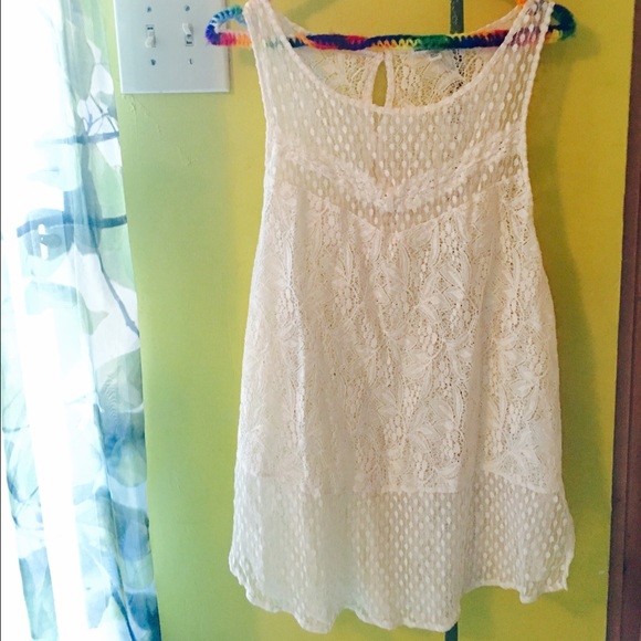 Lovely sheer lace tunic with back button detail