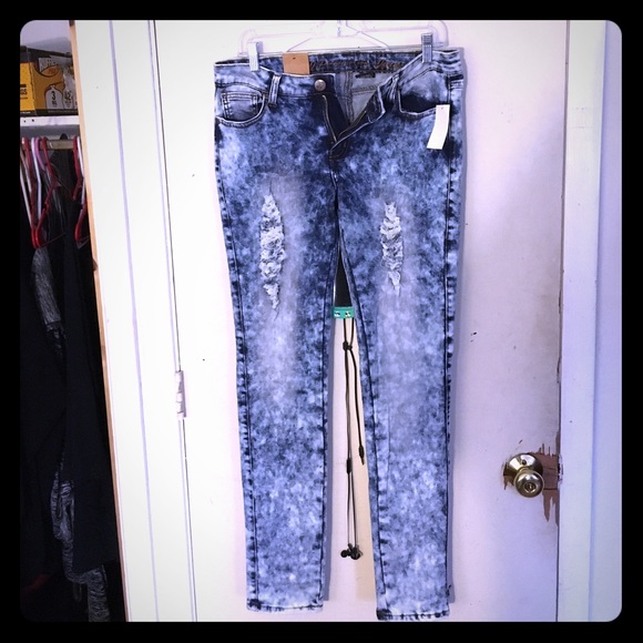 Acid wash ripped jeans