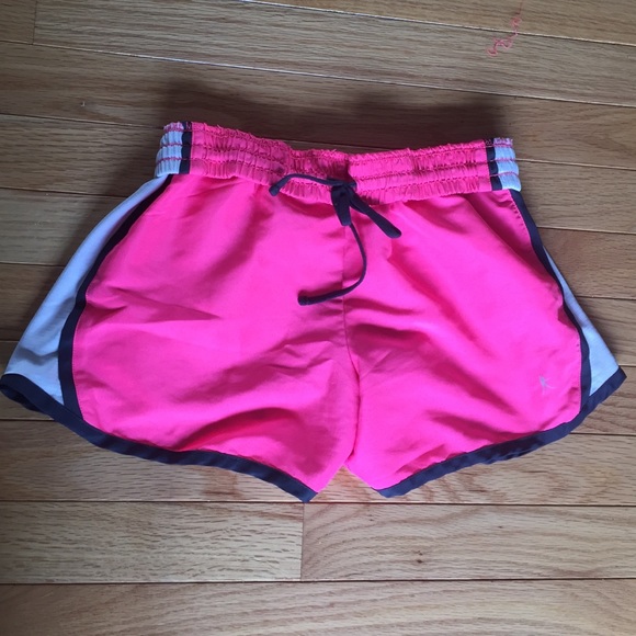 Bright pink gym shorts
