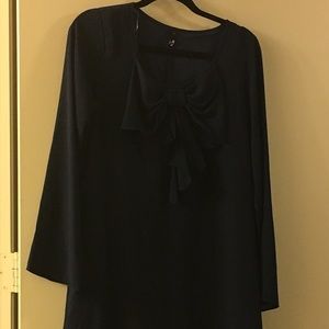 Navy blue dress with a bow on the front