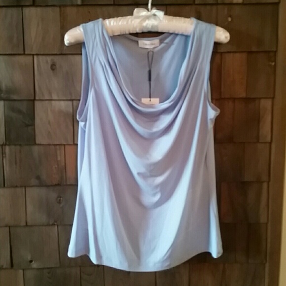 Calvin Klein shell with tags Large but more medium