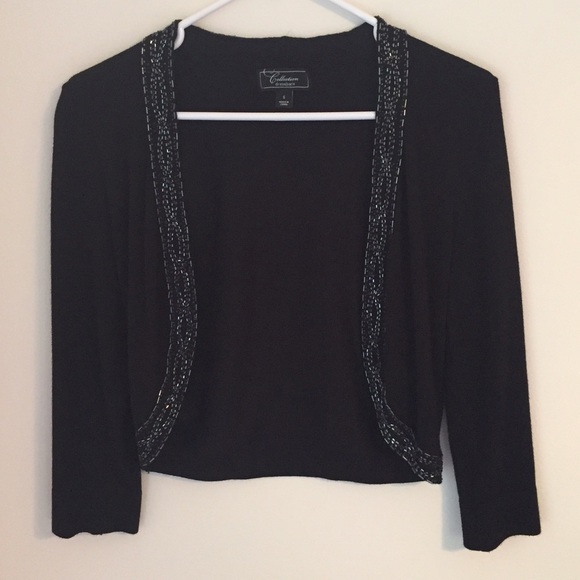 BLACK SHRUG W DETAILING EUC