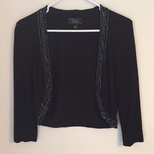 BLACK SHRUG W DETAILING EUC